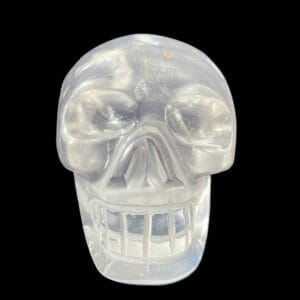 Clear quartz crystal skull with rainbows